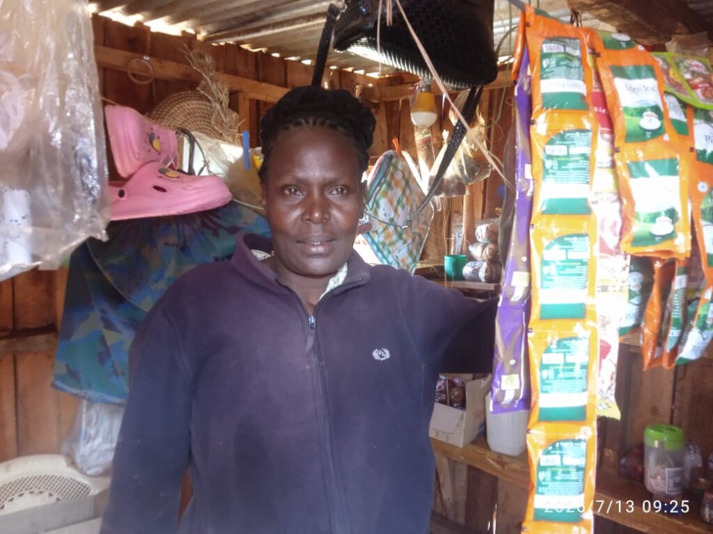 Christine Mwari in her kiosk, Mituntu