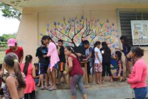 Children painting a mural