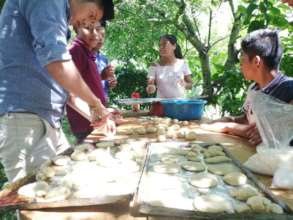 Young people making bread