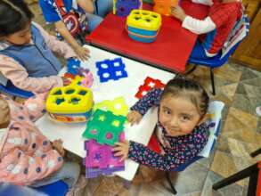 Children learning in one of our classrooms