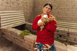 Beneficiaries with guinea pig livestock (X.Saer)