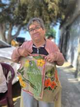 Women artisans learned about textile artwork.
