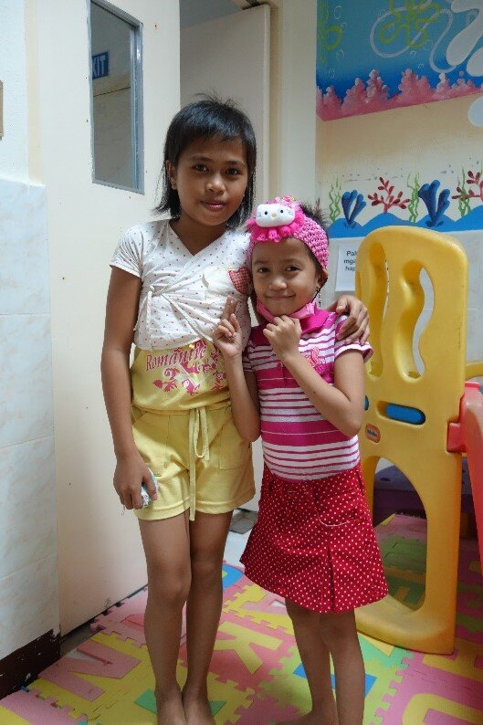 Ten-year-old Maria (pictured left)
