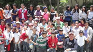 Director, Enrique de Esesarte, with children