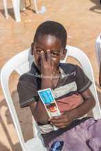 A boy in the community with his eco friendly tooth