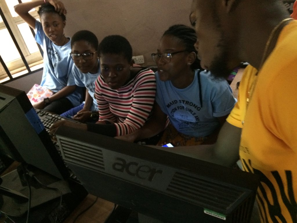 Maid Strong Girls Learning Computer Skills
