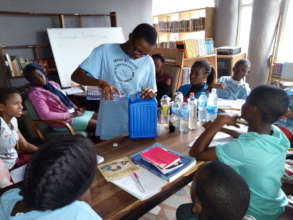 Maid Strong participants in Making Disinfectant