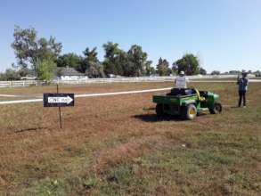 More fence work, and signage for overflow parking.