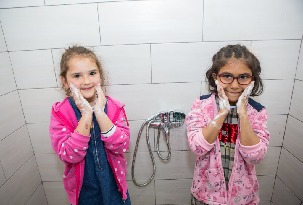 Give food, shower to 250 poor people in Albania