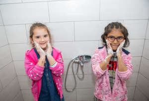Give food, shower to 250 poor people in Albania