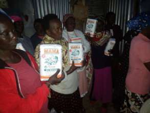 providing food stuffs to slum community