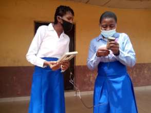 Girls showing work in MakeHer Space project