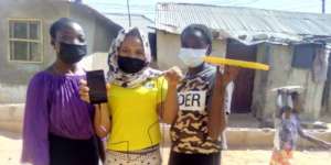 Girls showing work in MakeHer Space project