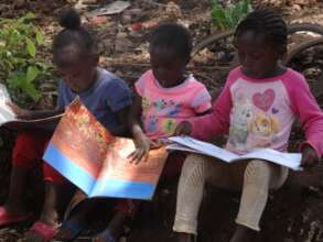 Children reading some story books
