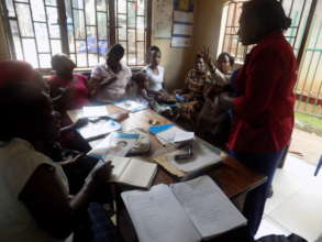 NAPADEC Staff training mothers sign language
