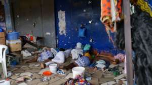 Kayayo girls sleeping on a veranda