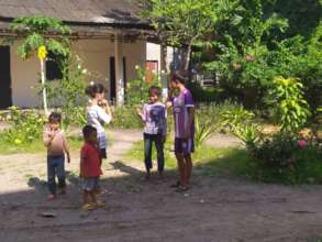 Playing paper and scissors in KCDI garden