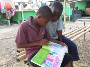 Students reading together after school