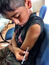 Gael injecting his insulin