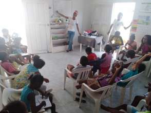Genelle teaching to the kiddies in Marlinda