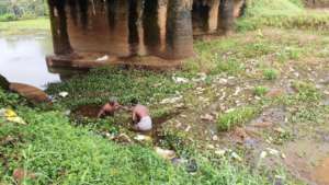 Manually removing clogged wastes