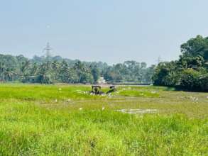 Mechanized field preparation in progress