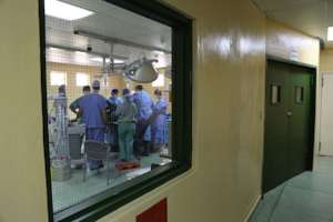 Visiting surgical team in the theatre