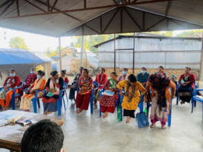 Women farmers receive training on COVID safety.