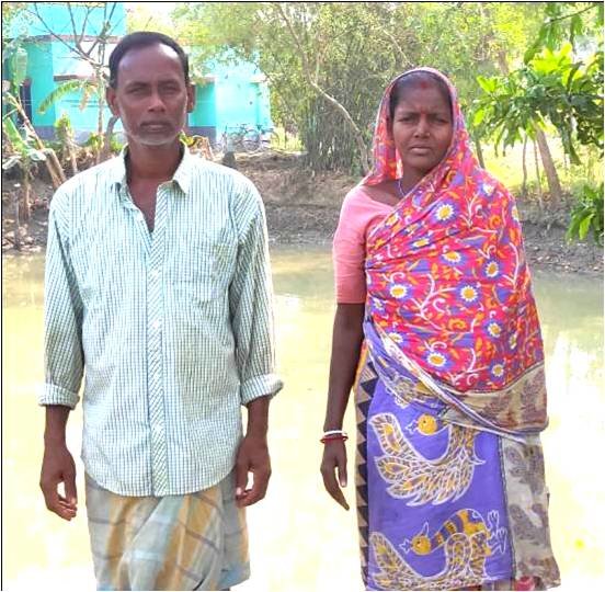 Ruipada* with his wife at his homestead Pond