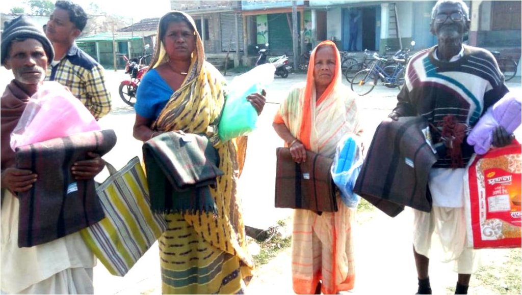 Senior community members with Relief Materials