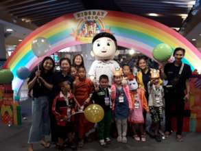 BEAM volunteers with children on Children's Day