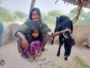 Mother and little with their goat