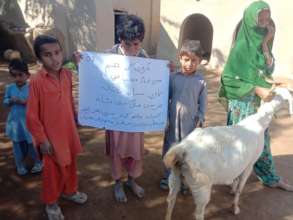 Goat being Handed Over to a Women