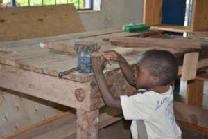 Helping out at the workshop