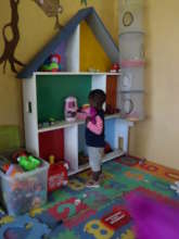 Playing with the dollhouse