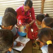 Gujarpa Basic School teacher and students