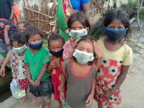 Children in Ramdhuni sporting their new masks