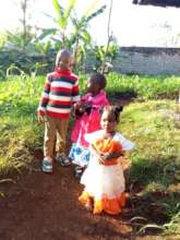 Derrick, Fidelis and little Sister in their home!