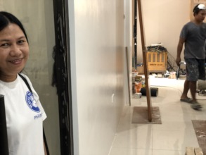 Midwife Cecille watches progress on birth center!