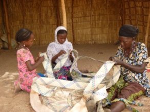 RAIN mentor and students weaving tabarma mats