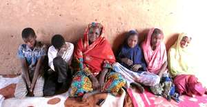 Assalama with her students, including Fatima.