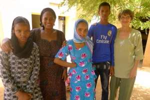 Halima (2nd from L) with students & founder Bess