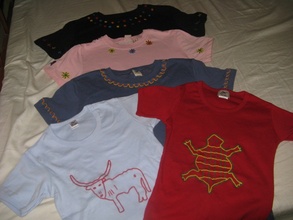 Beautifully embroidered tee shirts by the women.