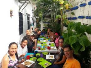 Workshop participants eating lunch in our patio