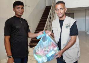 Sham's family receiving a parcel