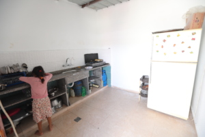 AFTER-New kitchen with running water and fridge