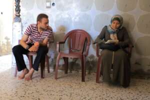 Heba asking Husam about his home and life