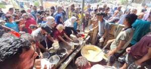 Huge lines of people in front of all kitchens