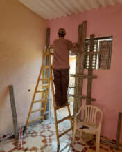 Refurbishing a front door for Mr. Shabana's family