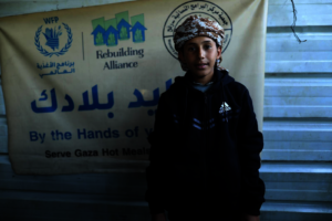 Amr, 14, received warm clothes